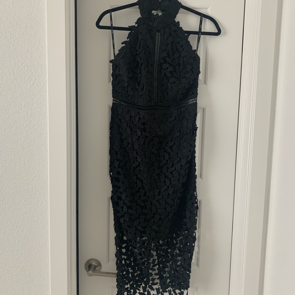 Black leaf dress. Knee length, low back, zipper, high neck